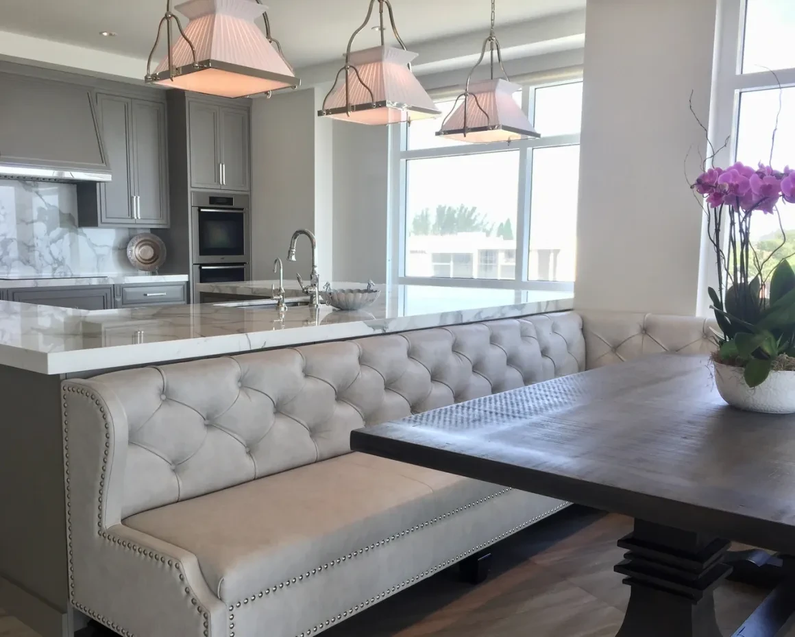Kitchen and dining area with a tufted banquette